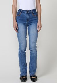 Джинсы Джинсы