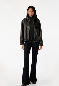 Клешеные брюки Клешеные брюки