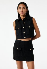 Жилет Жилет