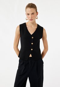 Жилет Жилет