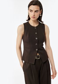 Жилет Жилет