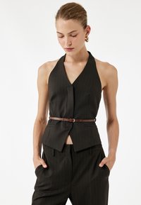 Жилет Жилет