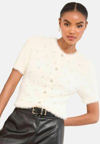 Пуховой жилет Пуховой жилет