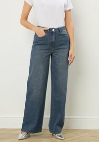 Джинсы Джинсы