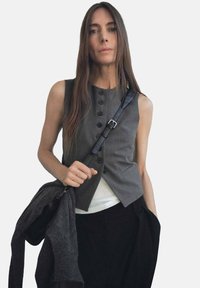 Жилет Жилет