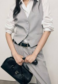 Жилет Жилет