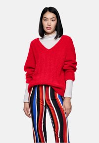 Длинный пуловер Длинный пуловер