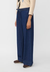 Широкие брюки Широкие брюки