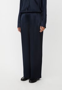 Широкие брюки Широкие брюки