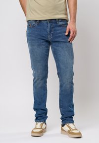 Узкие джинсы Узкие джинсы