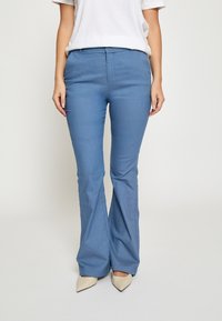 Клешеные брюки Клешеные брюки