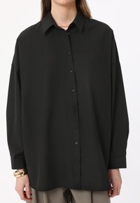 Длинная блузка Длинная блузка