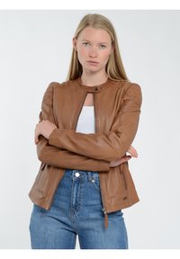 Кожаная куртка Кожаная куртка