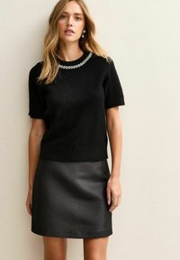 Пуловер с коротким рукавом Пуловер с коротким рукавом