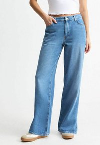 Свободные джинсы Свободные джинсы