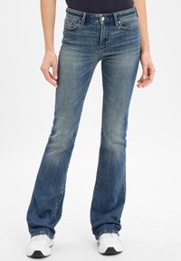 Клешеные брюки Клешеные брюки