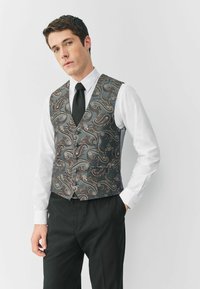 Жилет Жилет