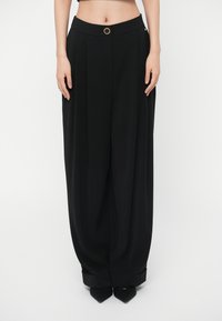 Широкие брюки Широкие брюки