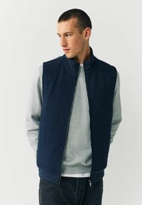 Жилет Жилет