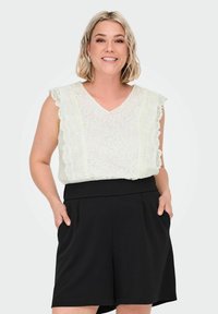 Блузка без рукавов Блузка без рукавов