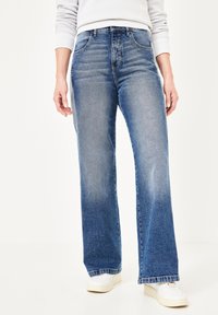 Широкие брюки Широкие брюки