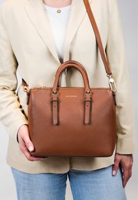 Кожаная сумка Кожаная сумка