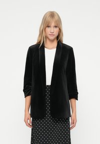 Блейзер Блейзер