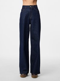 Свободные джинсы Свободные джинсы