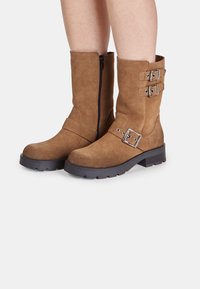 Ковбойские сапоги Ковбойские сапоги