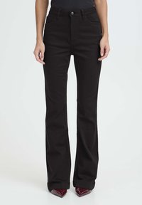 Клешеные брюки Клешеные брюки