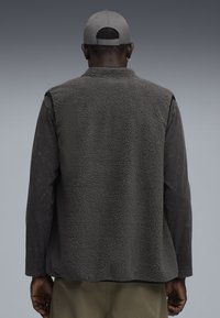 Жилет Жилет