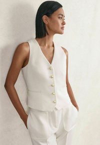 Жилет Жилет