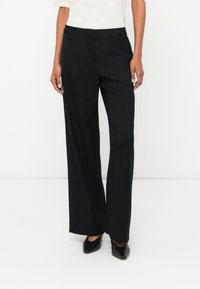 Широкие брюки Широкие брюки