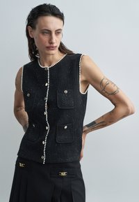 Жилет Жилет