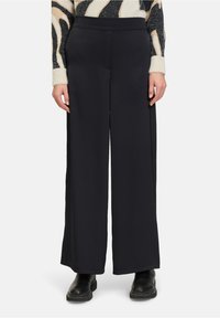 Широкие брюки Широкие брюки