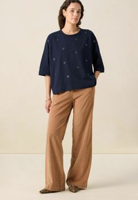 Широкие брюки Широкие брюки