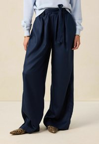 Широкие брюки Широкие брюки