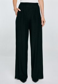 Широкие брюки Широкие брюки