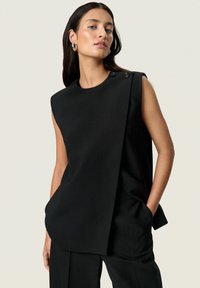 Жилет Жилет