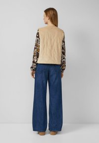 Жилет Жилет