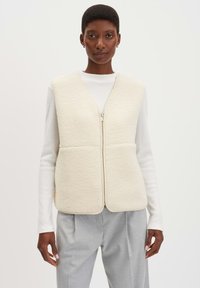 Жилет Жилет