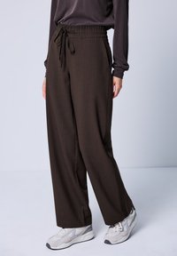 Широкие брюки Широкие брюки