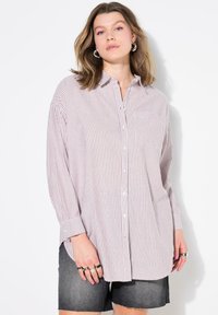 Длинная блузка Длинная блузка