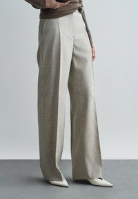 Широкие брюки Широкие брюки