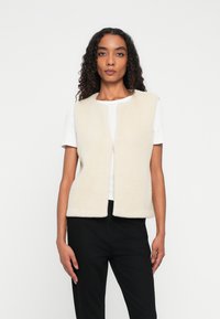 Жилет Жилет