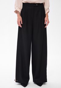 Широкие брюки Широкие брюки