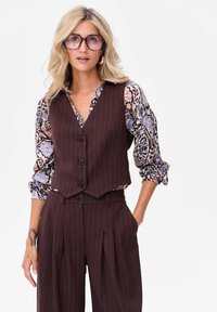 Жилет Жилет