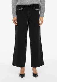 Клешеные джинсы Клешеные джинсы