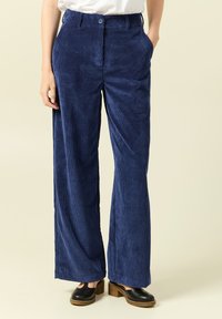 Широкие брюки Широкие брюки