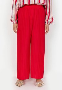 Широкие брюки Широкие брюки